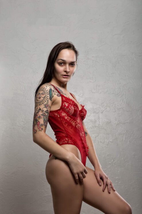 Image of Ayeonna Gabrielle in red body suit