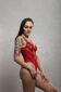 Image of Ayeonna Gabrielle in red body suit