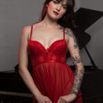 kennedy-h-flashing-a-bit-of-red-babydoll-baby-grand-piano-norman-ok