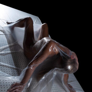 Marie Brooks vacuum sealed portrait session creative dark art shoot traveling model