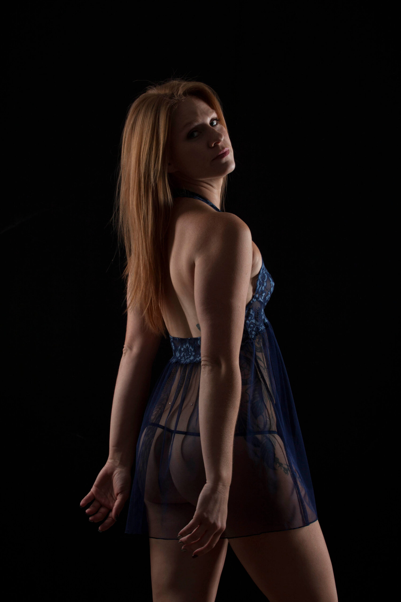 Robin Faye boudoir themed portrait session blue outfit