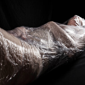 A wrapped in Saran Wrap dark art themed photo shoot Oklahoma City, OK