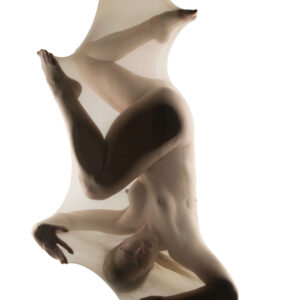 Rebecca Lawrence poses nude inside stretched translucent fabric, suspended upside down against a bright white background with her arms and legs pressing into the material.